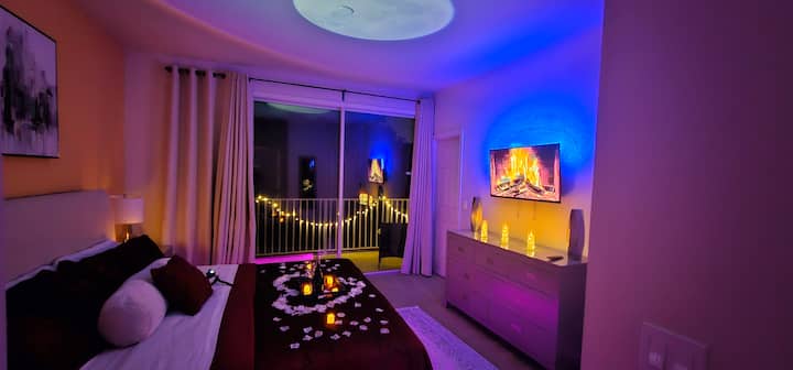 Included decor with dark red duvet and white petals  - alcohol not included