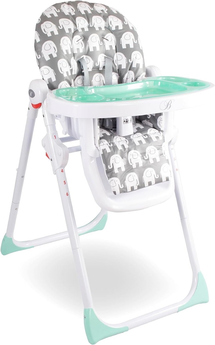 A high chair designed for children features a padded seat with a playful elephant pattern. The sturdy white frame is complemented by a mint green tray, ensuring a secure and comfortable dining experience. The adjustable height allows for versatile use.