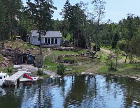 Cabin with sauna by the water