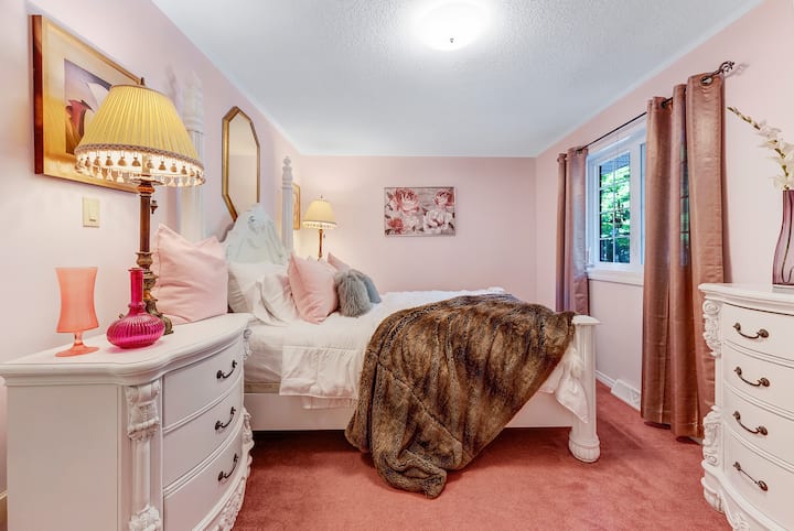 The Princess Suite - queen bed, ample closet space and garden views. 