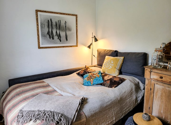 Couch sofa - European Standard Double bed with top mattress and king size down duvet and pillows.