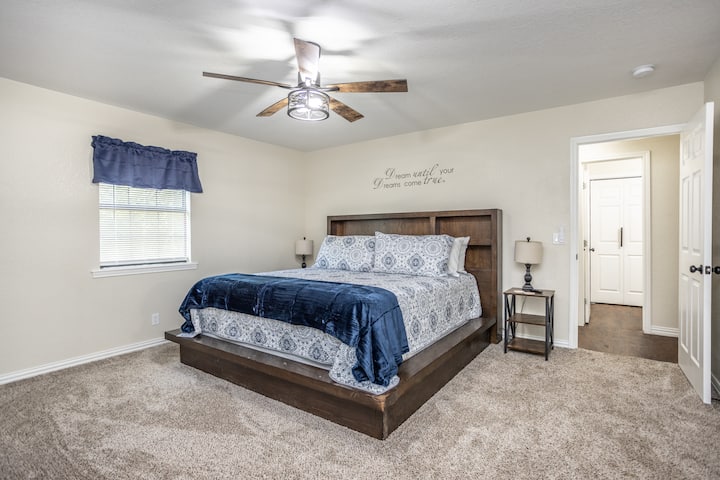 Indulge in luxury with your own private bathroom, walk-in closet equipped with hangers and luggage racks, and a spacious king bed. Enjoy entertainment on a smart TV offering a wide range of streaming options.