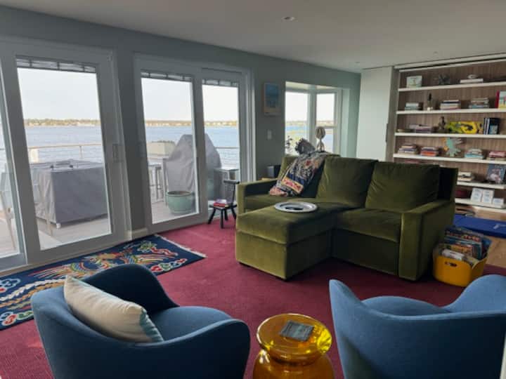 Water-view living space with modern queen sofa bed (no metal bars!)
