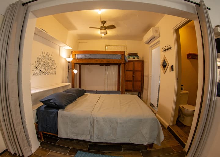The main dwelling is the Annex which can be rented as a 1 bedroom apartment (see Airbnb Annex listing). The Loft & Annex includes a second bedroom with its own en suite bathroom that shares the patio and washing machine area with the Annex. 