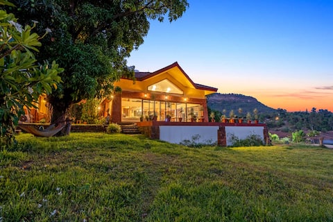 StayVista at Three Shores w/ Lake View, Lawn, BBQ