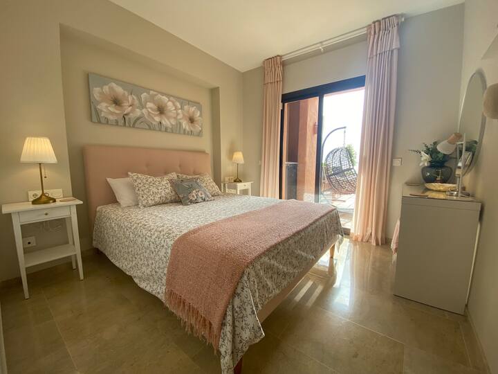 Master en-suite bedroom with direct access to the terrace. Includes a European king size bed (160 x 200cm ) plenty of wardrobe space, dressing table, black out shutter blinds and hot & cold air conditioning.
