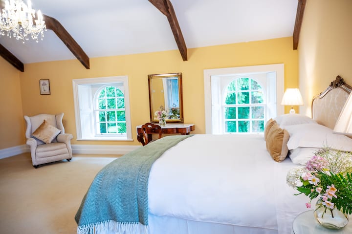 Beams bedrooms has trible windows great light. This room can be converted into twins plus we can add an extra bed.