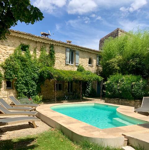 House with a pool and garden