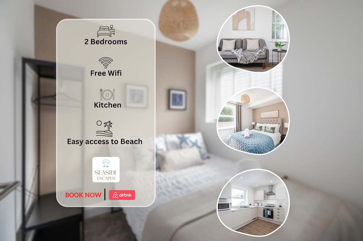 A cozy bedroom with natural light features a spacious bed adorned with soft linens. An accent chair and wall art are visible, while an open closet provides storage. Nearby, a bright kitchen with modern appliances and a dining area can be seen, contributing to a welcoming atmosphere.