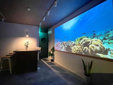 Seaside, Resort-Style Room with Large Projector