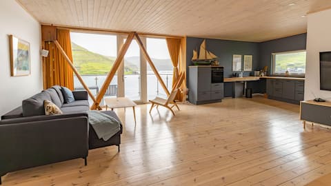 "Seglhúsið" · Oceanfront Apt + Balcony Views