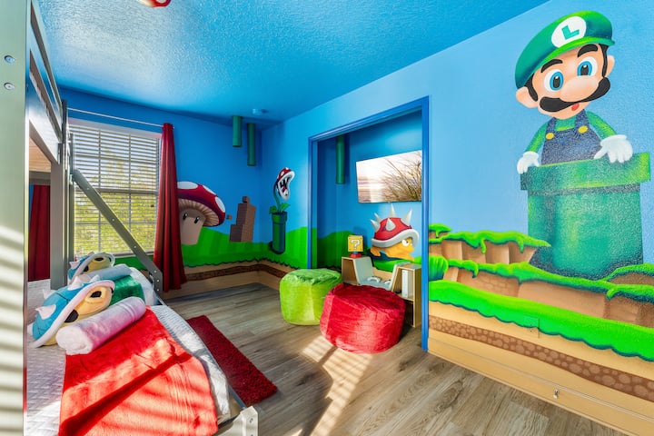 היכנסו לעולם של Mario Bros בחדר שלנו, המתגאה בתחנת משחקים של Xbox ועיצוב מהמם.