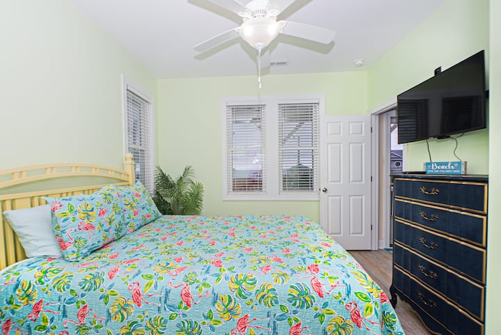 slight ocean views from the upstairs bedroom windows. Queen room upstairs. Balcony door is right outside bedroom door.
All linens and towels provided. Extra Pillows and blankets.
There is a pack n play stored in this closet too.