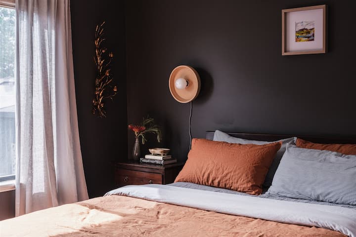 We've dialed up the mood for extra cosy and indulgent sleep ins! Bedroom 1 is located on the main living floor adjacent to the bathroom and toilet. 