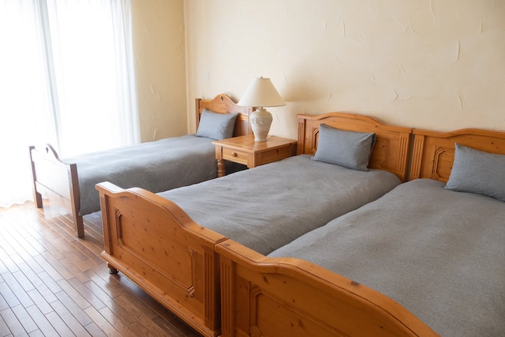 2 single beds, 1 semi-single bed.