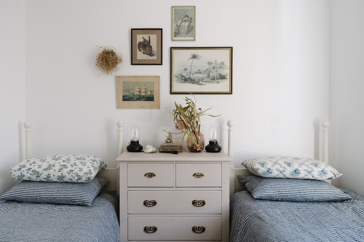 Twin beds for midnight chats and sharing secrets