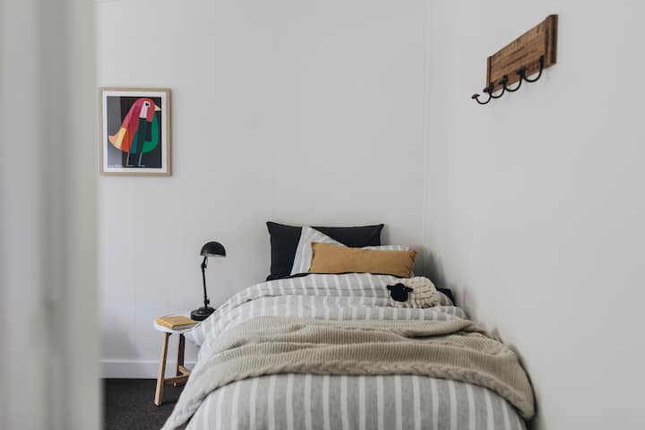 Bedroom 2 can be configured as another. King bed suitable for a couple OR as 2 plush singles