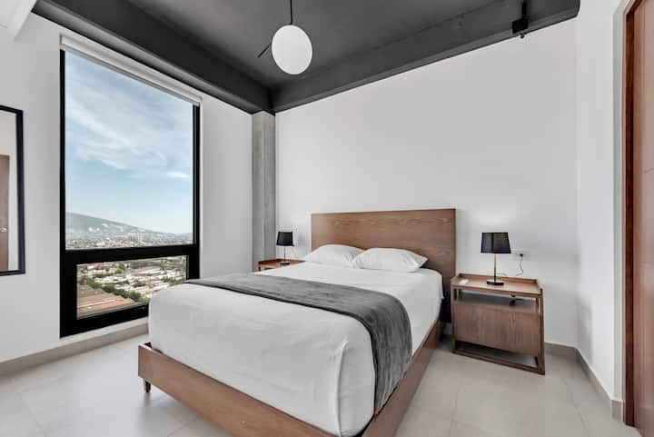 Comfortable and spacious queen bed.