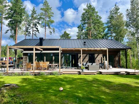 Large accommodation with social areas where sea & forest meet