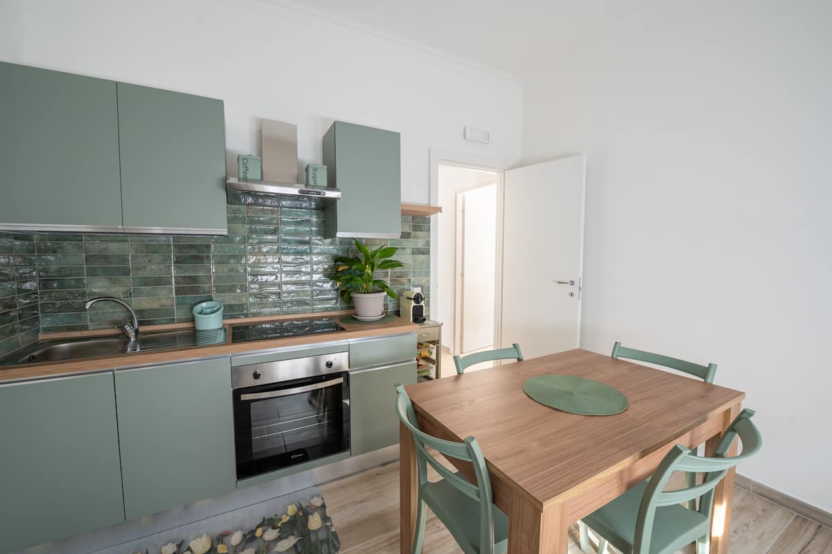 Cozy Apartment "Vacanze Romane Tuscolana — Zona pranzo 1 | Roma