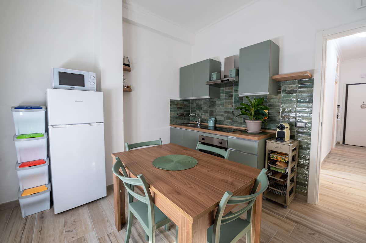 Cozy Apartment "Vacanze Romane Tuscolana — Cucina completa 6 | Roma