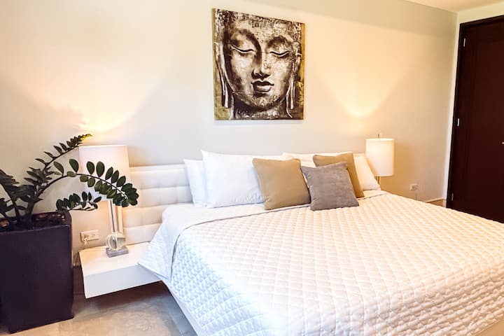 Comfortable and stylish: our bedroom includes a king-sized bed, ceiling fan, and linen provided, ensuring a restful and comfortable stay
