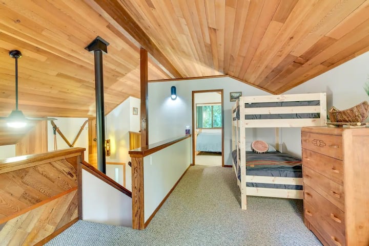 Loft with bunk bed. Couch and tv also in this space but not pictured. Extra linens in the dresser. 