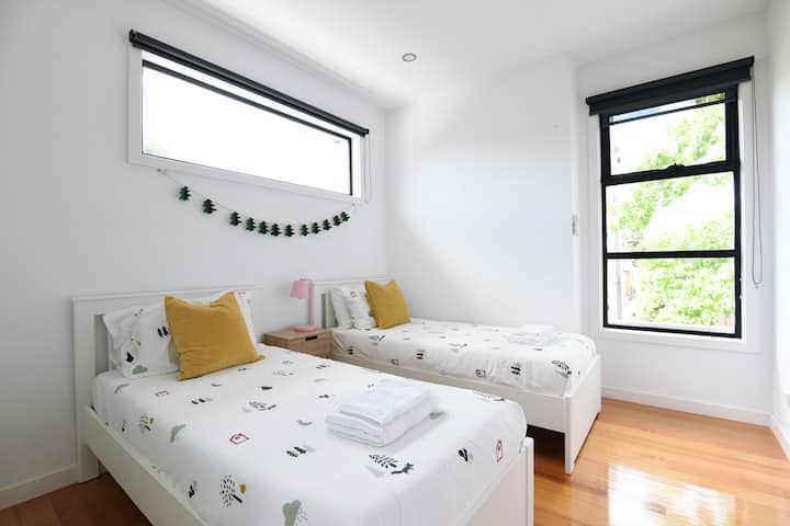 A simple, yet comfortable twin room for a restful night's sleep.