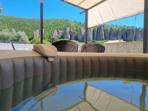 house with hot tub and views of the penitents