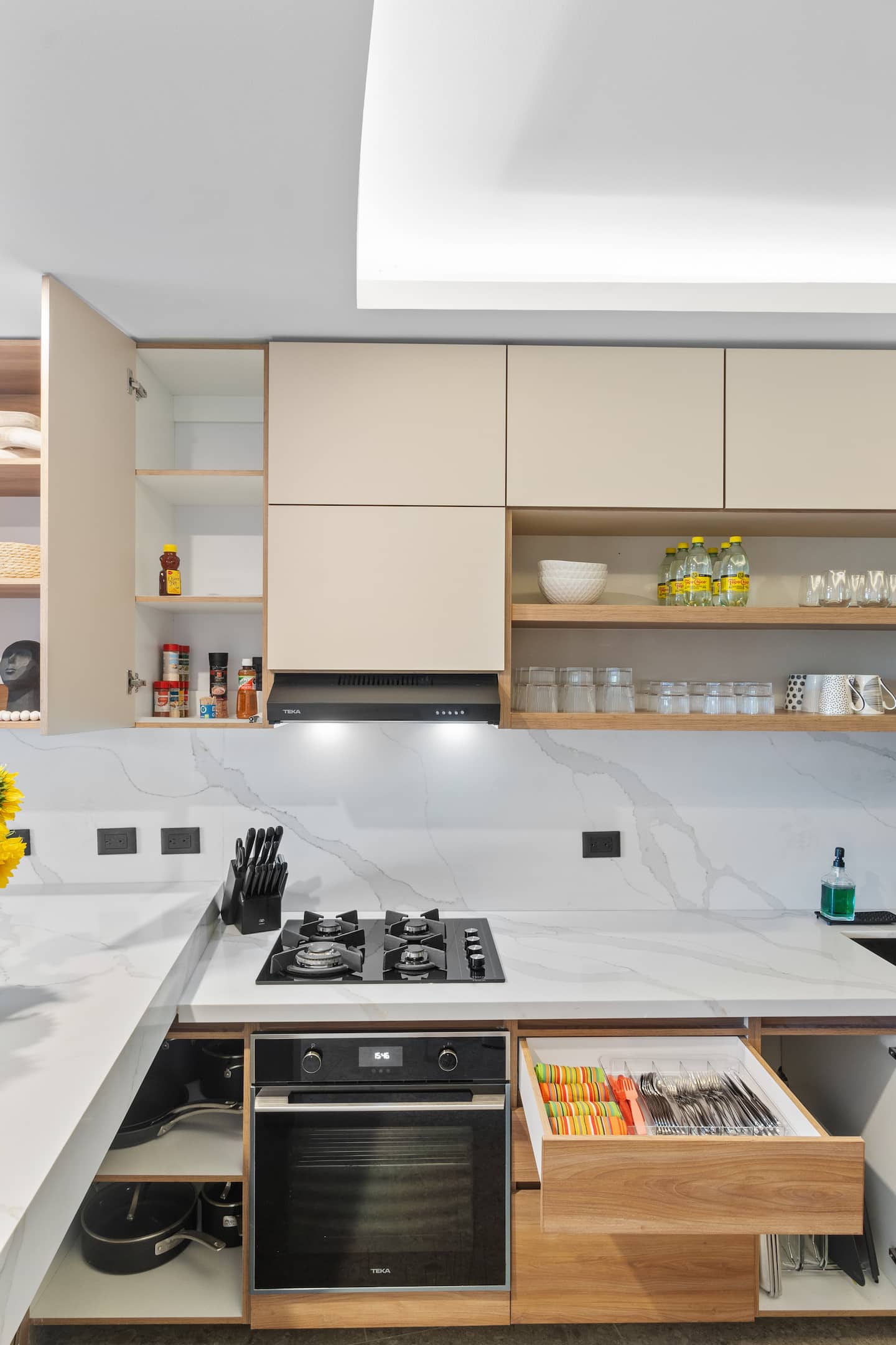 Cook something worth the effort: gas stove, full oven, marble countertops, sharp knives. It's all here.