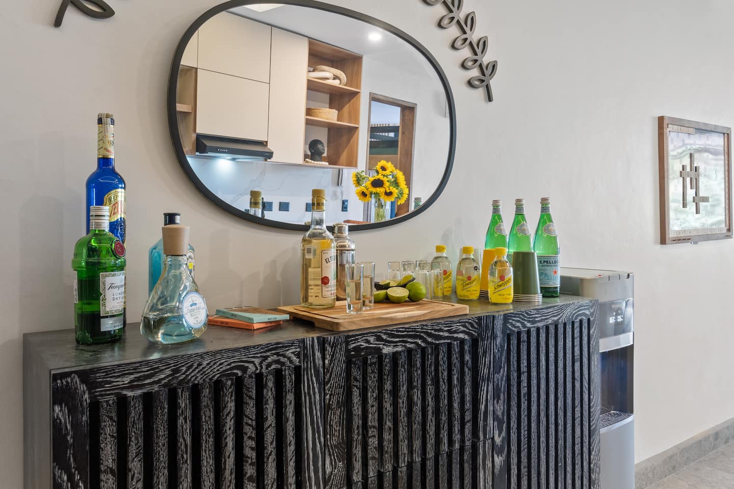 Mix whatever you're having: tequila, gin, fresh lime, Perrier.