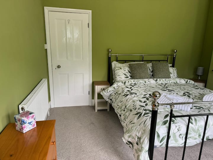 First floor bedroom with outlook over the Severn Way and Holt Lock.