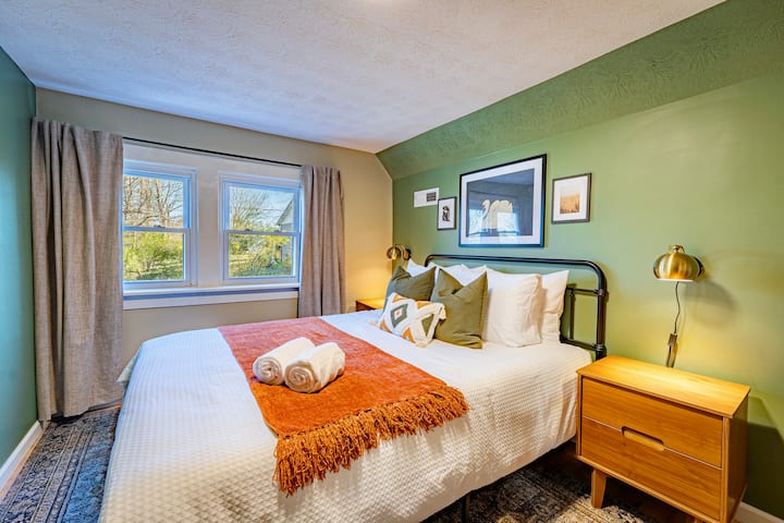 Get cozy in our forest green room with blackout curtains!
