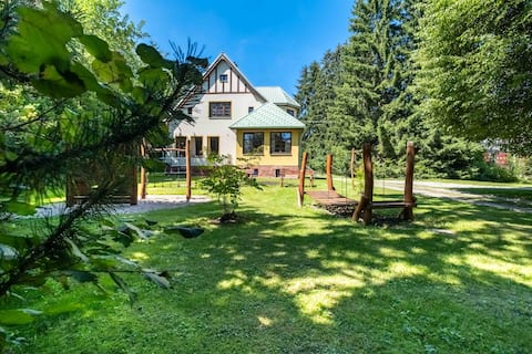 Villa with covered pool, park and playground
