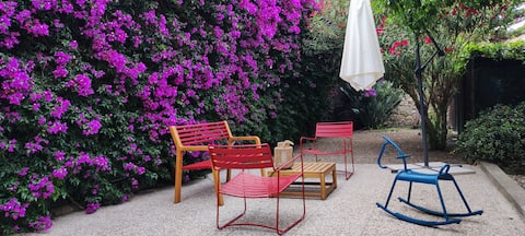 house and garden, seaside pedestrian area