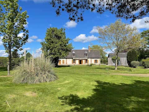 Family home with pool, pond and garden