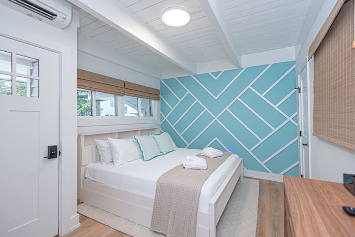 Sleep peacefully in the King sized bed on the 1st level- complete with blackout lined shades. A thoughtfully designed powder room is also attached to this room.