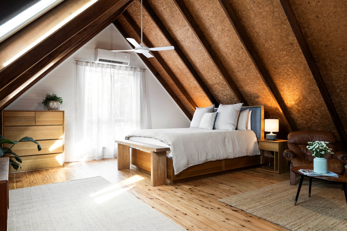 Upstairs Bedroom and Living room, the perfect Parents retreat.