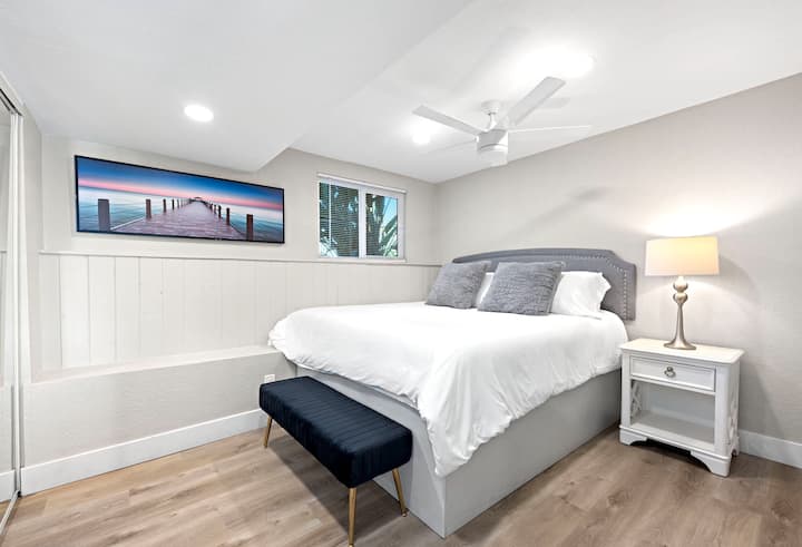 This is your bedroom with king bed, TV & closet opening up to the downstairs living room and pool area