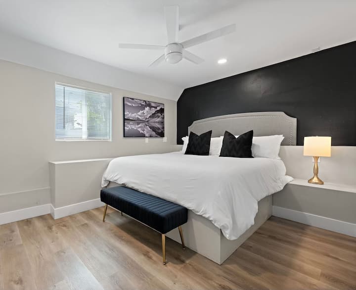 This is downstairs bedroom with king bed and private TV 