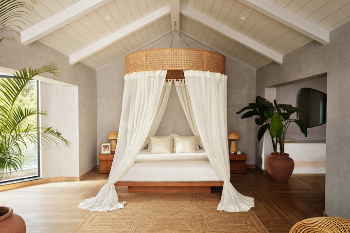 Sleep in my four-poster bed.  I know you'll love the crisp white sheets and cozy canopy. 