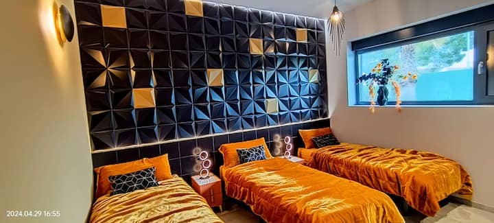 Chambre 1- 3 lits simples en 90cm