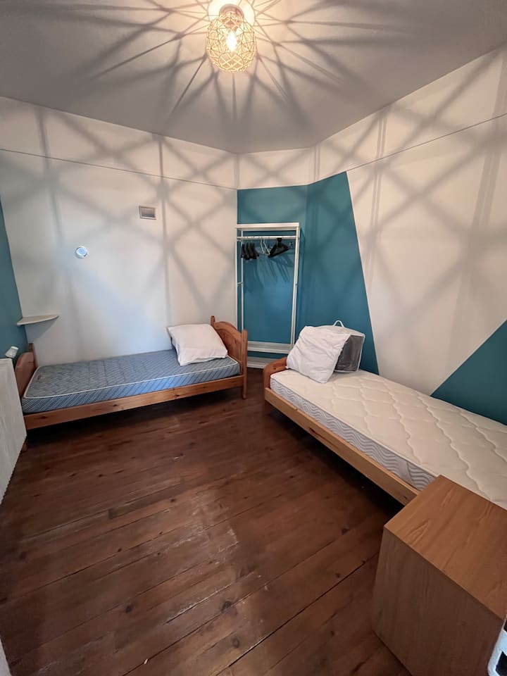 BEDROOM 1 WITH 2 BEDS 90CM