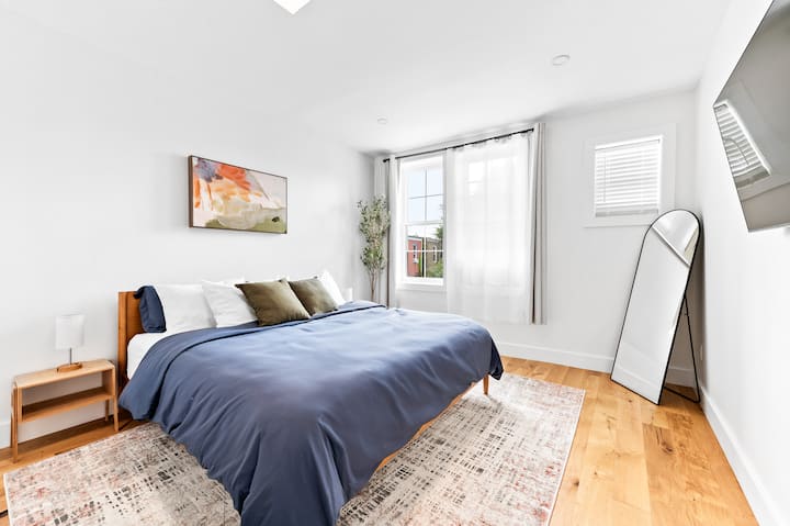 Master bedroom with king size bed with TV and ensuite private bathroom!