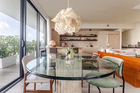 Popular Airbnb listing: Design District Gem In The Sky | Pool, Gym, Park! in Midtown