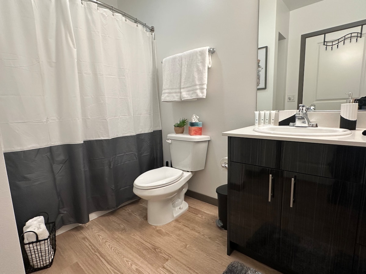 Nice spacious bathroom. We provide a spa quality starter kit of shampoo, conditioner, bodywash, lotion and a bar of soap for your convince.