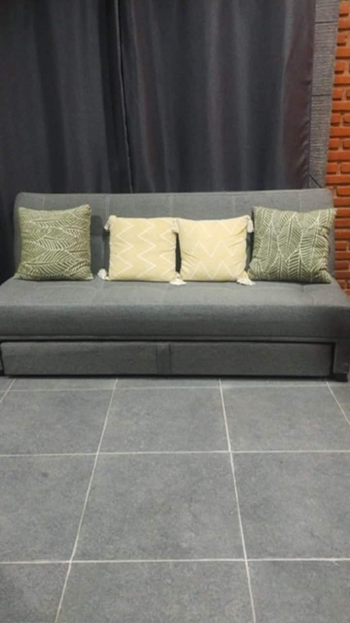 Queen size sofa bed, sleeps 2 people very comfortably and downstairs there is a single mattress.