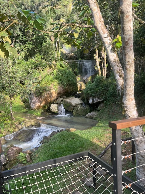 Chalet with private waterfall