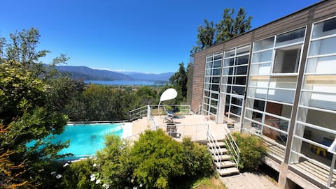 House overlooking lagoon and forests.