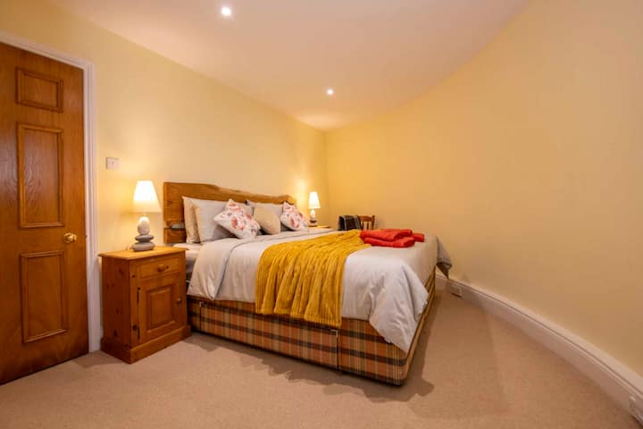 The super king bedroom is the best place to relax after a day of traveling